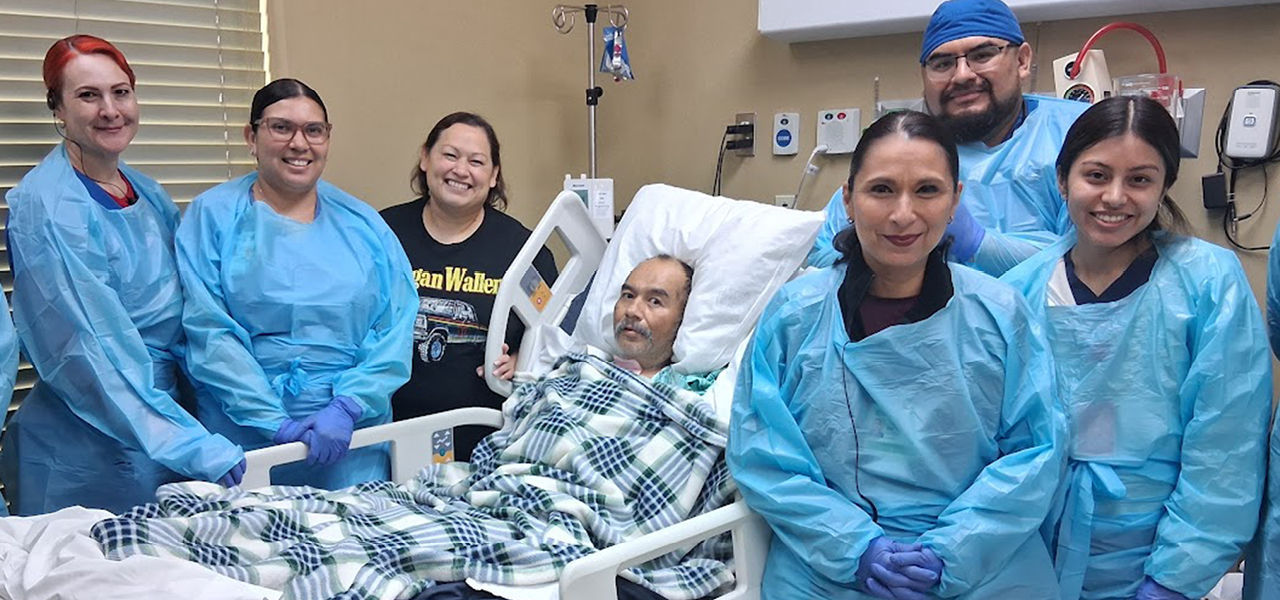 Solara Specialty Hospital Harlingen patient Lee Roy poses with his care team 
