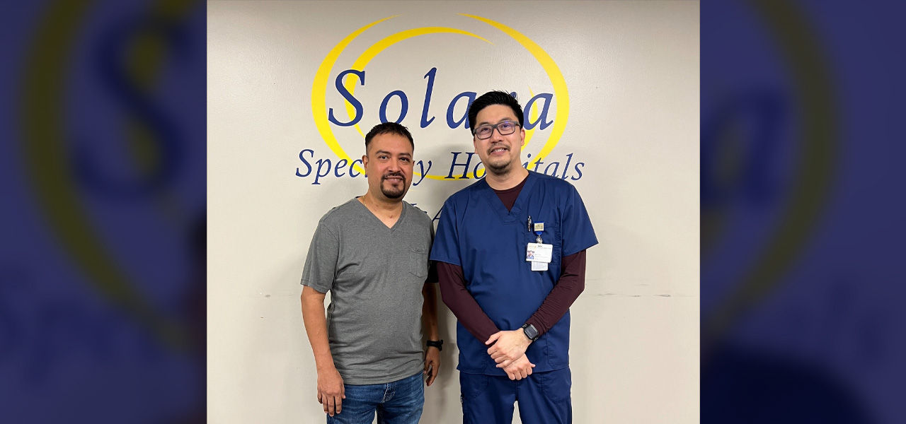 Solara Specialty Hospital McAllen patient Leobardo stands with his caregiver